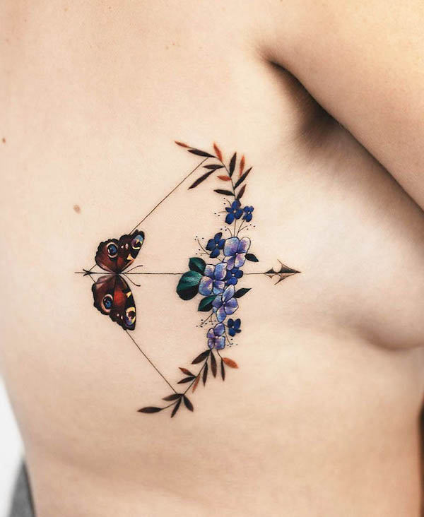 tatuaggio farfalla punto e virgola